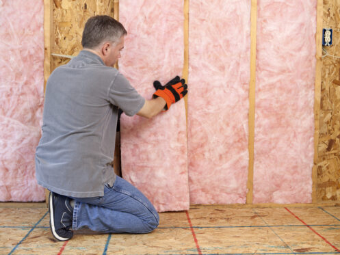 Man Installing Insulation in Billings