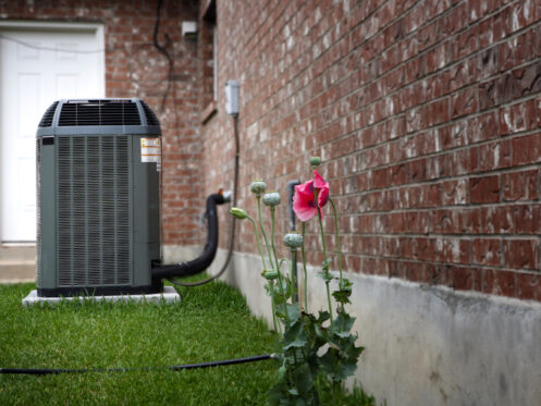 An AC system in the backyard of a Billings, MT home
